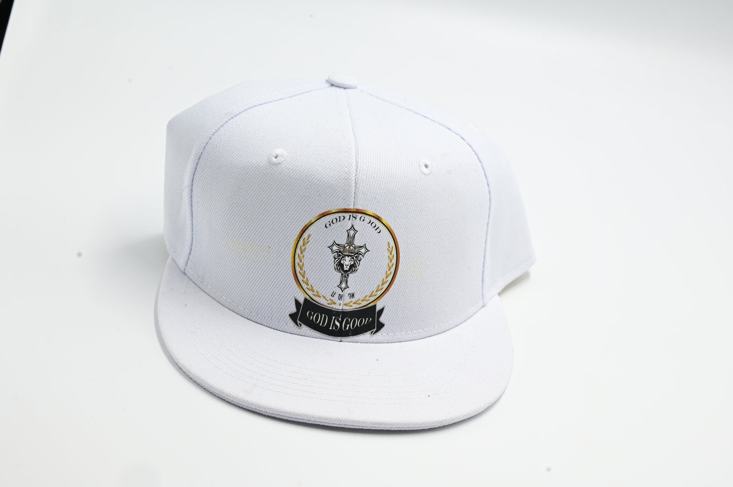 White cap with a logo on a white background
