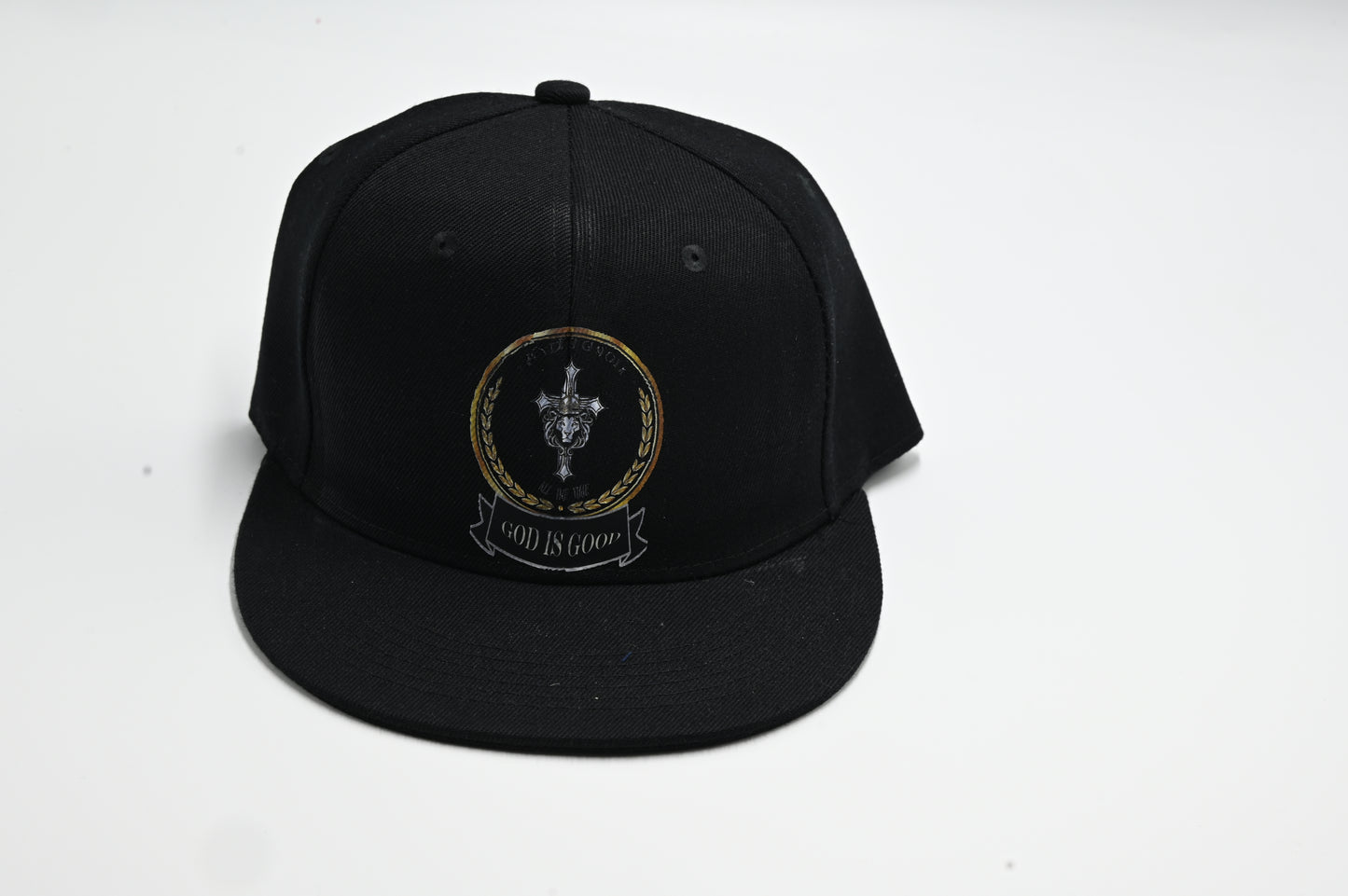 Black cap with a logo and text on a white background