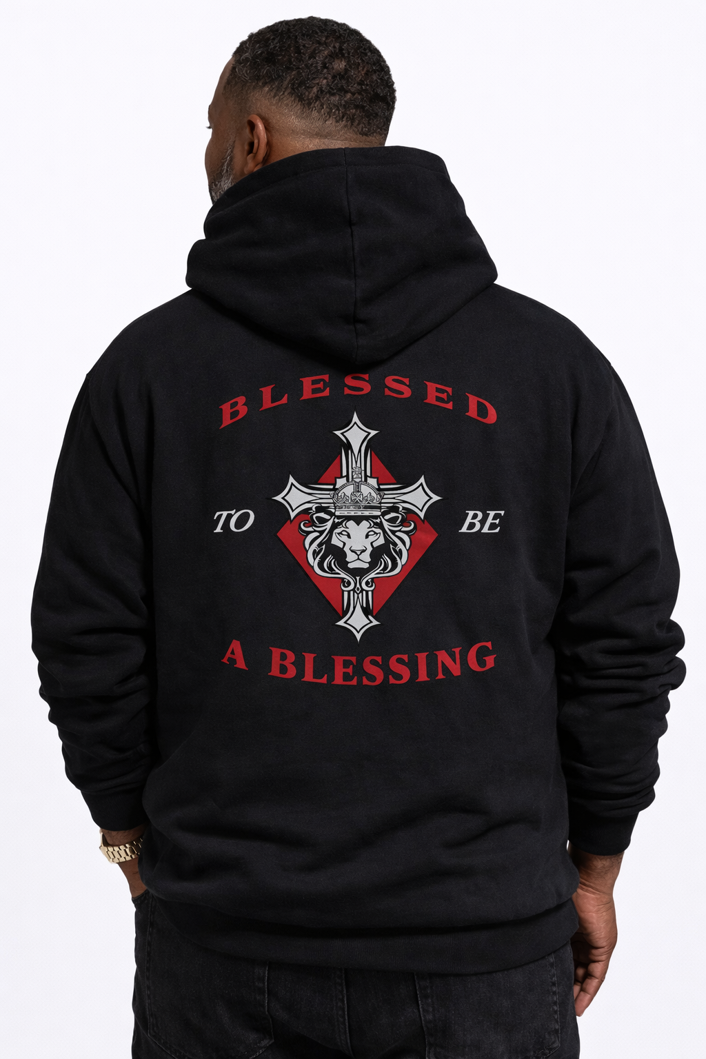 Black hoodie with 'Blessed to be a Blessing' text and design on the back, worn by a person.
