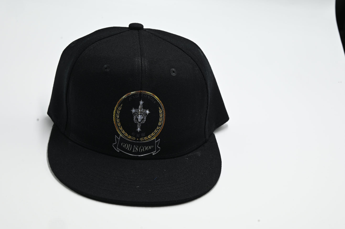 Black cap with a logo on a white background